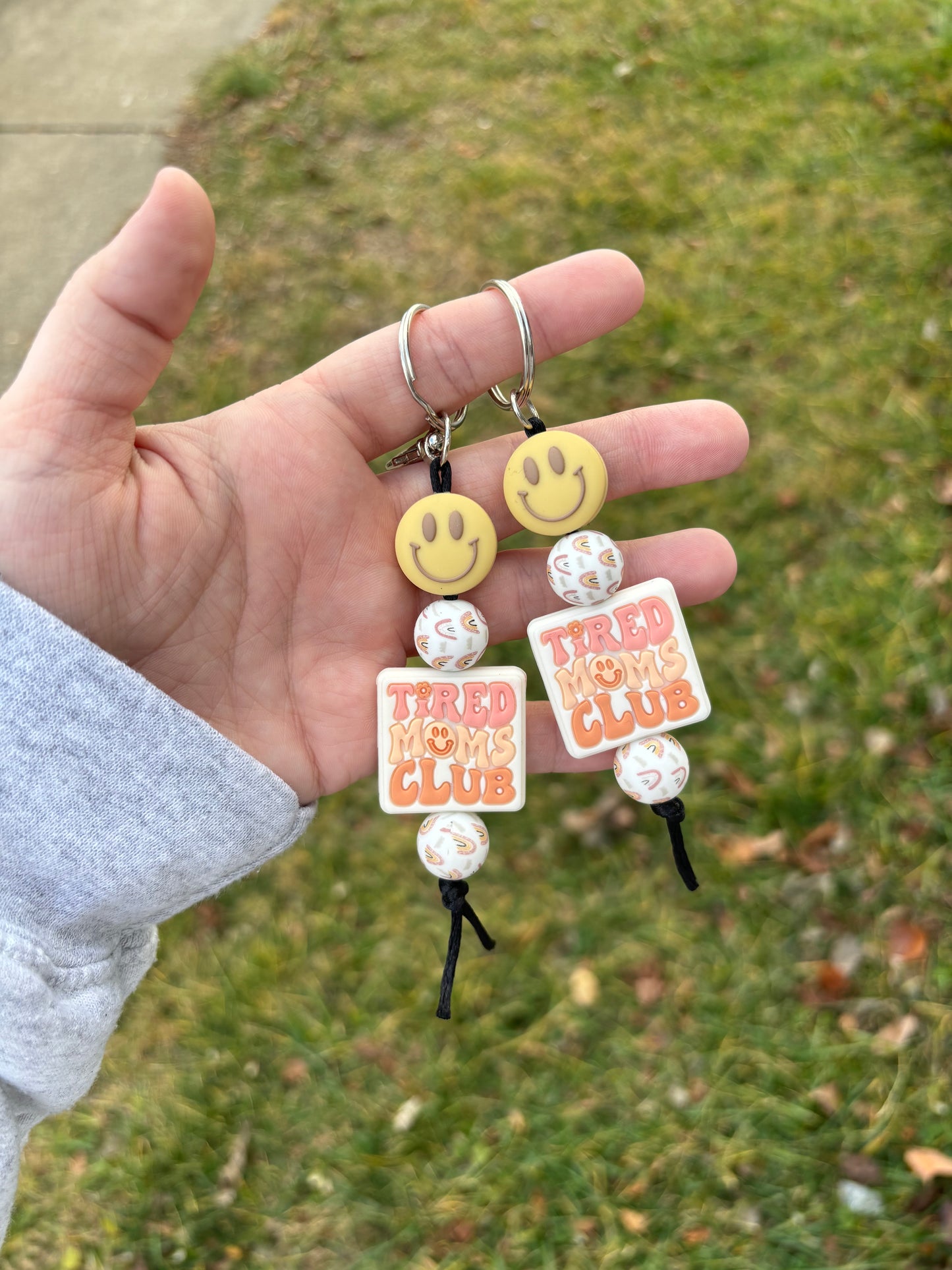 Smiley Tired Moms Club Keychain